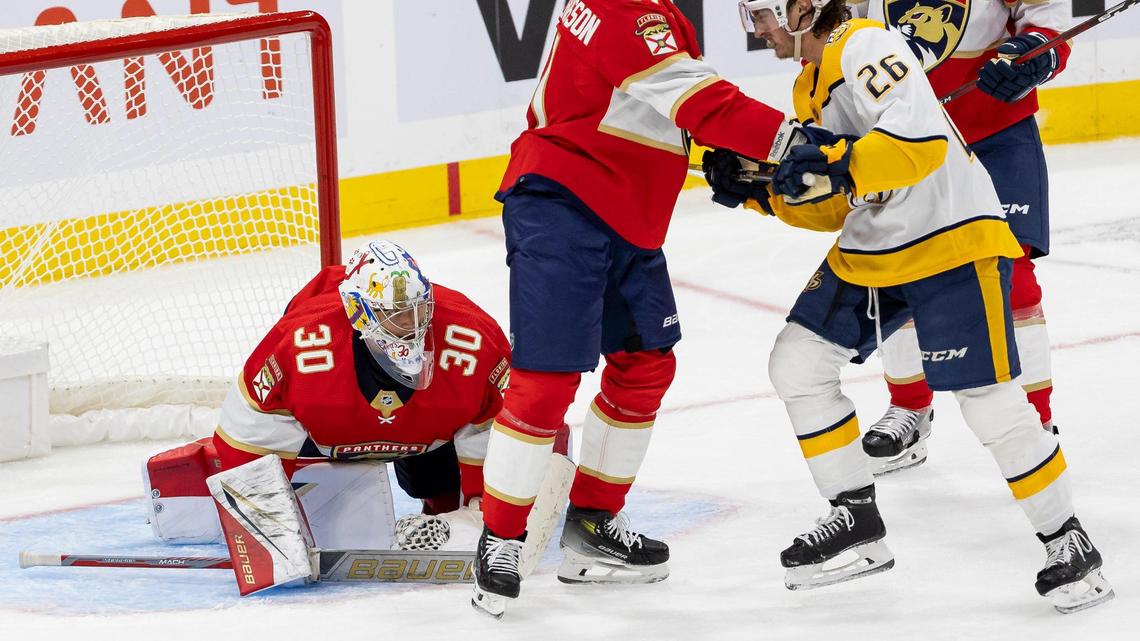 Florida Panthers goalie Spencer Knight (30) blocks a shot by the Nashville Predators in the second period of an NHL preseason game at the Amerant Bank Arena on Monday, Sept. 25, 2023, in Sunrise, Fla.