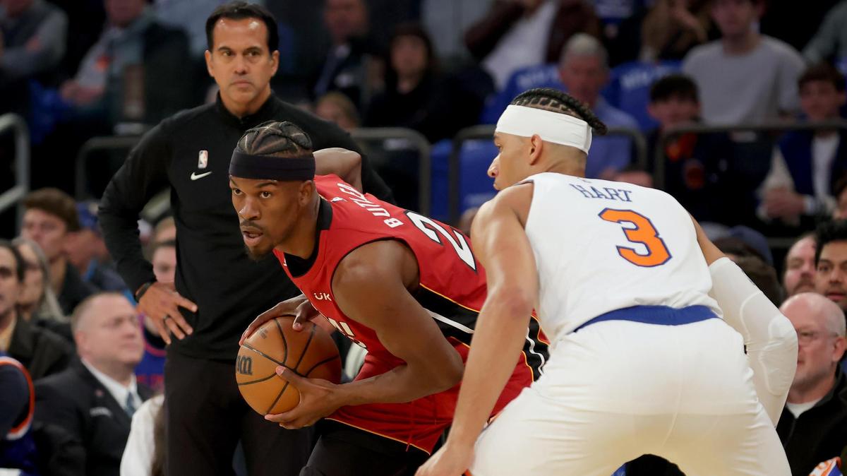 Apr 30, 2023; New York, New York, USA; Miami Heat head coach Erik Spoelstra watches as Heat forward Jimmy Butler (22) controls the ball against New York Knicks guard Josh Hart (3) during the first quarter of game one of the 2023 NBA Eastern Conference semifinal playoffs at Madison Square Garden.