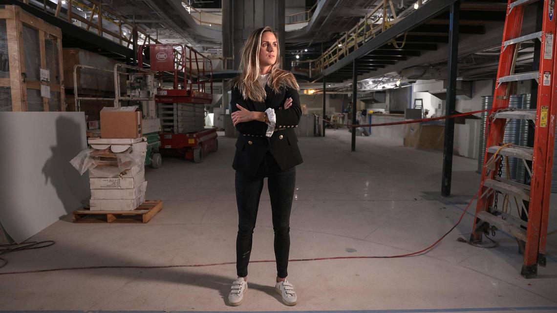 School of Whales’ co-founder and CEO Andrea Petersen, 37, started her commercial real estate investment fund company in May with Daniel Pena-Giraldi, 45, the company’s co-founder and COO. Above: Petersen is photographed Dec. 16, 2021, inside Julia and Henry’s in downtown Miami. Her company is partnering with builder Stambul to convert the old drugstore building into a speakeasy and food hall.