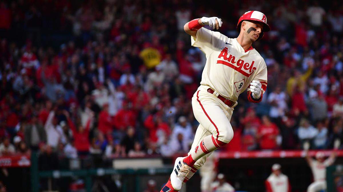 Los Angeles Angels shortstop Zach Neto (9) runs after hitting a solo home run against the Houston Astros during the third inning at Angel Stadium on May 9, 2023.