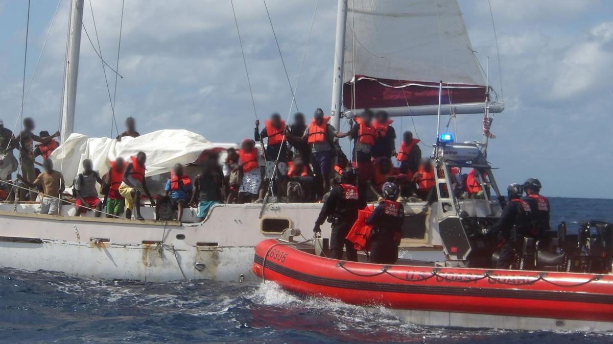 Coast Guard and U.S. Customs crews intercept a migrant boat overloaded with 132 people from Haiti Tuesday, Feb. 4, 2025.