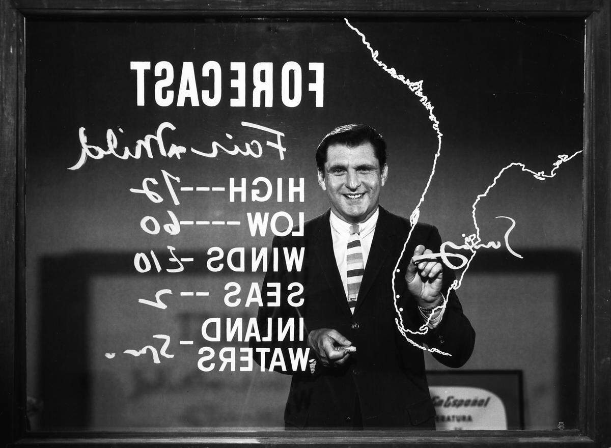 Bob Weaver in 1967 on the WTVJ set. During his 56-year career at the Miami TV station, he became known as Weaver the Weatherman, who could write the forecast backwards before the days of the back-projected weather video.