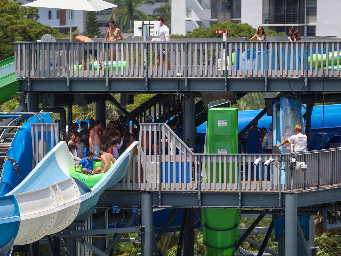The five-acre Tidal Cove wate rpark is viewed from the Presidential Suite as visitors and hotel guests enjoy the waterslide on Thursday, August 15, 2024, in Aventura, Florida.