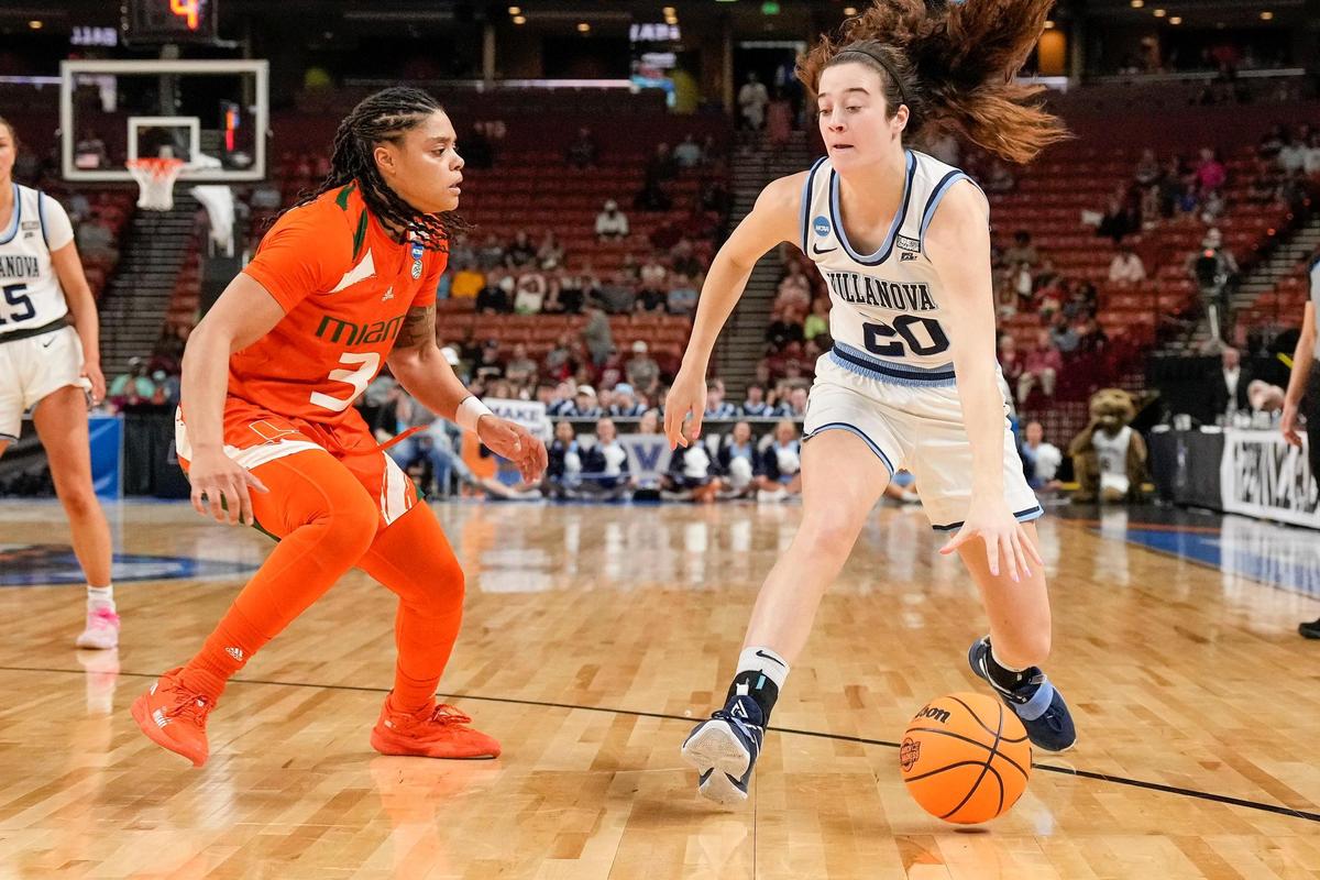 Mar 24, 2023; Greenville, SC, USA; Villanova Wildcats forward Maddy Siegrist (20) dribbles against Miami Hurricanes forward Destiny Harden (3) during the NCAA Women’s Tournament at Bon Secours Wellness Arena. Mandatory Credit: Jim Dedmon-USA TODAY Sports