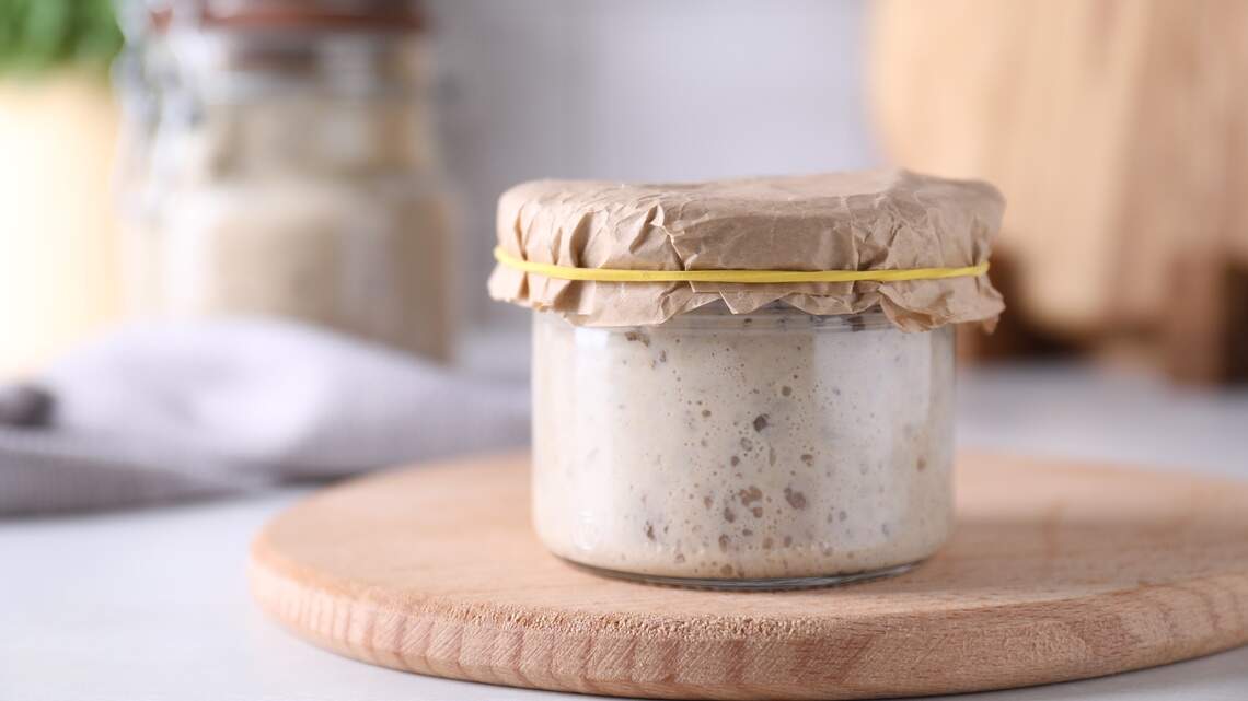 Sourdough starter is full of live bacteria, so why isn’t sourdough bread considered a probiotic food?