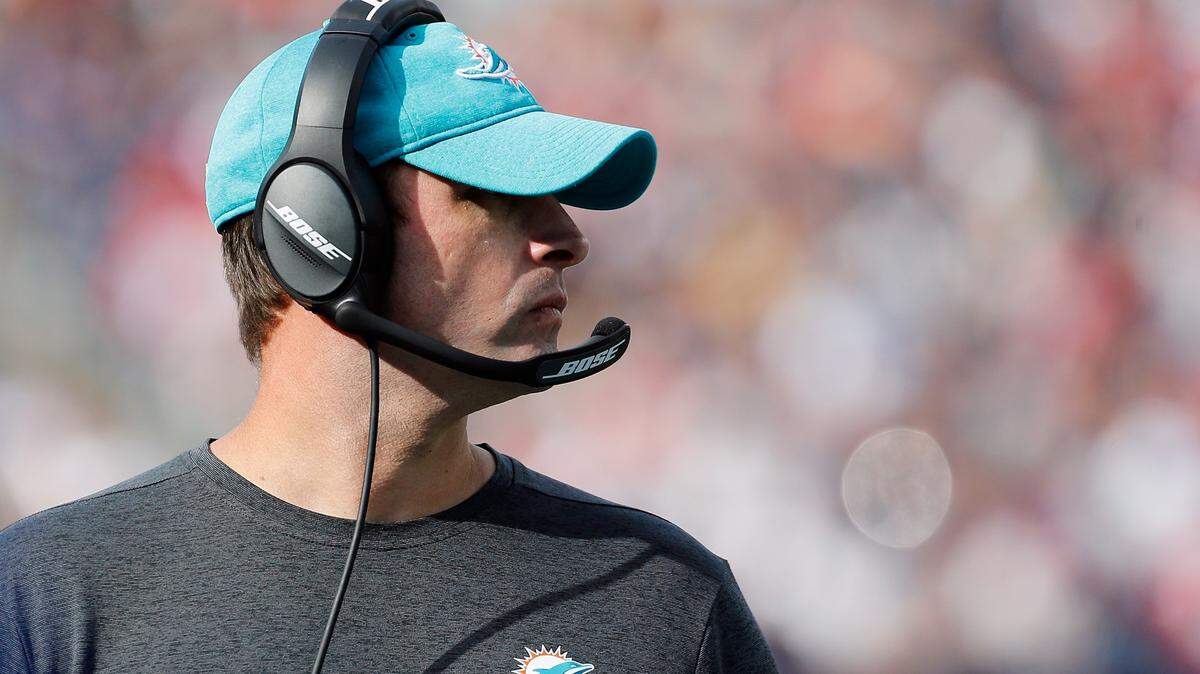 FOXBOROUGH, MA - SEPTEMBER 30:  Head coach Adam Gase of the Miami Dolphins looks on during the game against the New England Patriots at Gillette Stadium on September 30, 2018 in Foxborough, Massachusetts.  (Photo by Jim Rogash/Getty Images)
