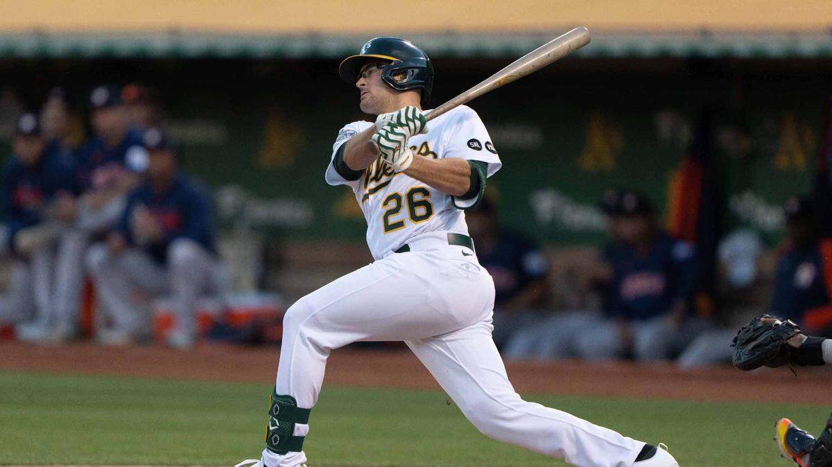 Jul 21, 2023; Oakland, California, USA; Oakland Athletics third baseman Jonah Bride (26) hits the ball during the fourth inning against the Houston Astros at Oakland-Alameda County Coliseum.