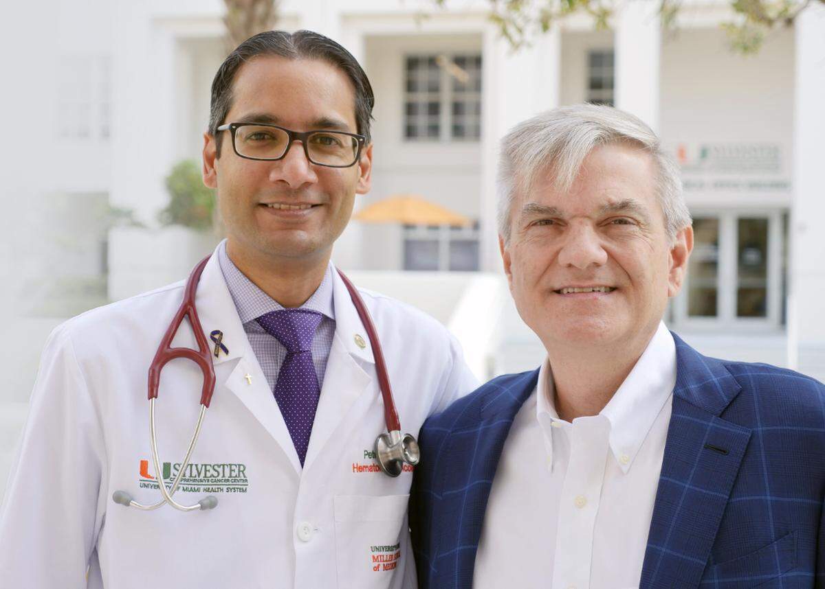 Dr. Peter Hosein, an expert in pancreatic cancer at Sylvester Comprehensive Cancer Center with his patient, Luis Rios, who was diagnosed with Stage 4 pancreatic cancer in 2017.