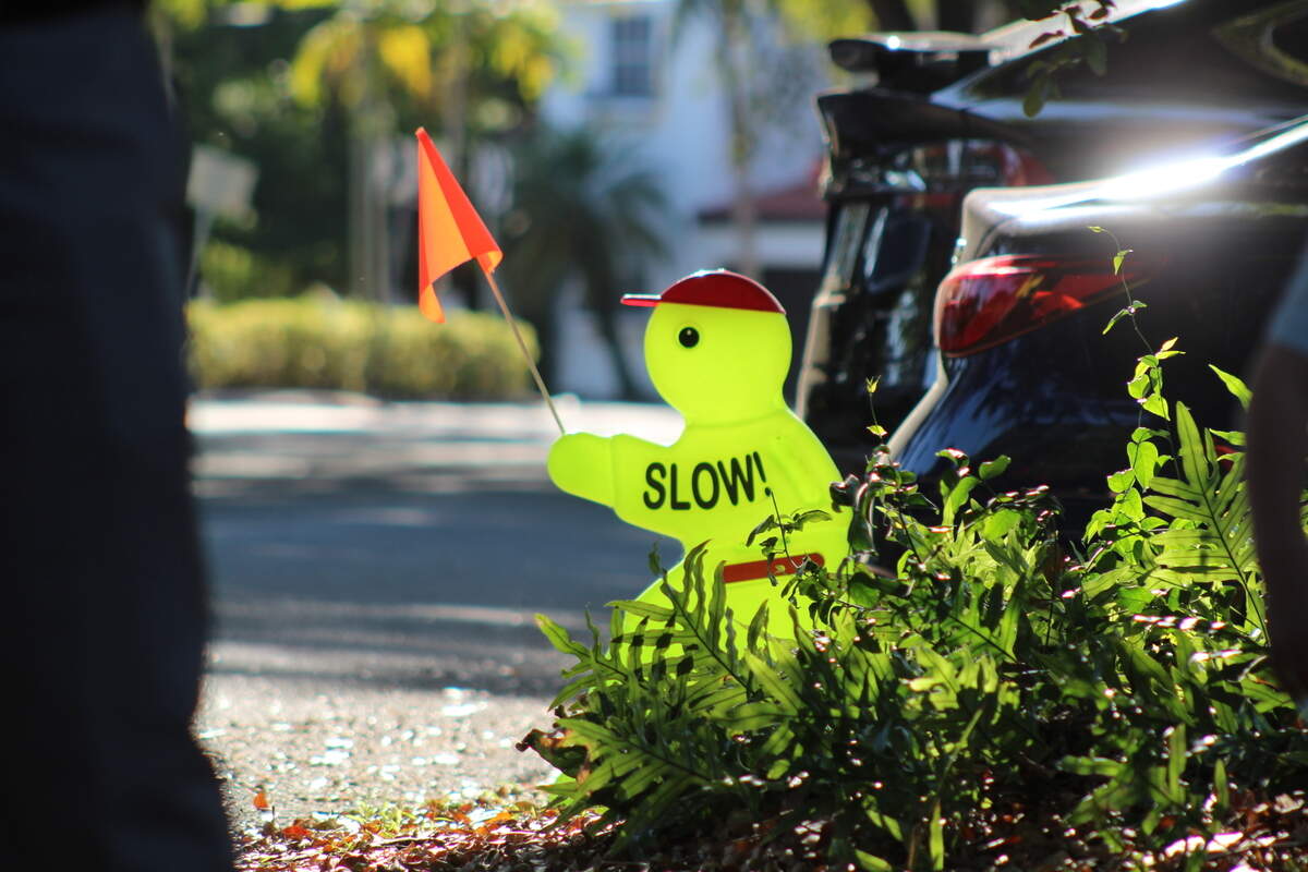 Signs to warn drivers to slow down in the Italian Village neighborhood of Coral Gables, Wednesday, March 12, 2025.