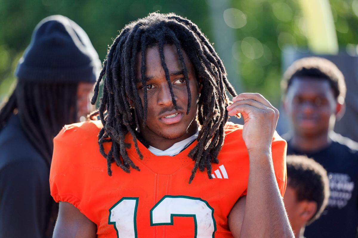 University of Miami wide receiver Malachi Toney (12) meets with fans after the Miami Hurricanes football spring game at Cobb Stadium on UM’s campus in Coral Gables, Florida on Saturday, April 12, 2025. 
