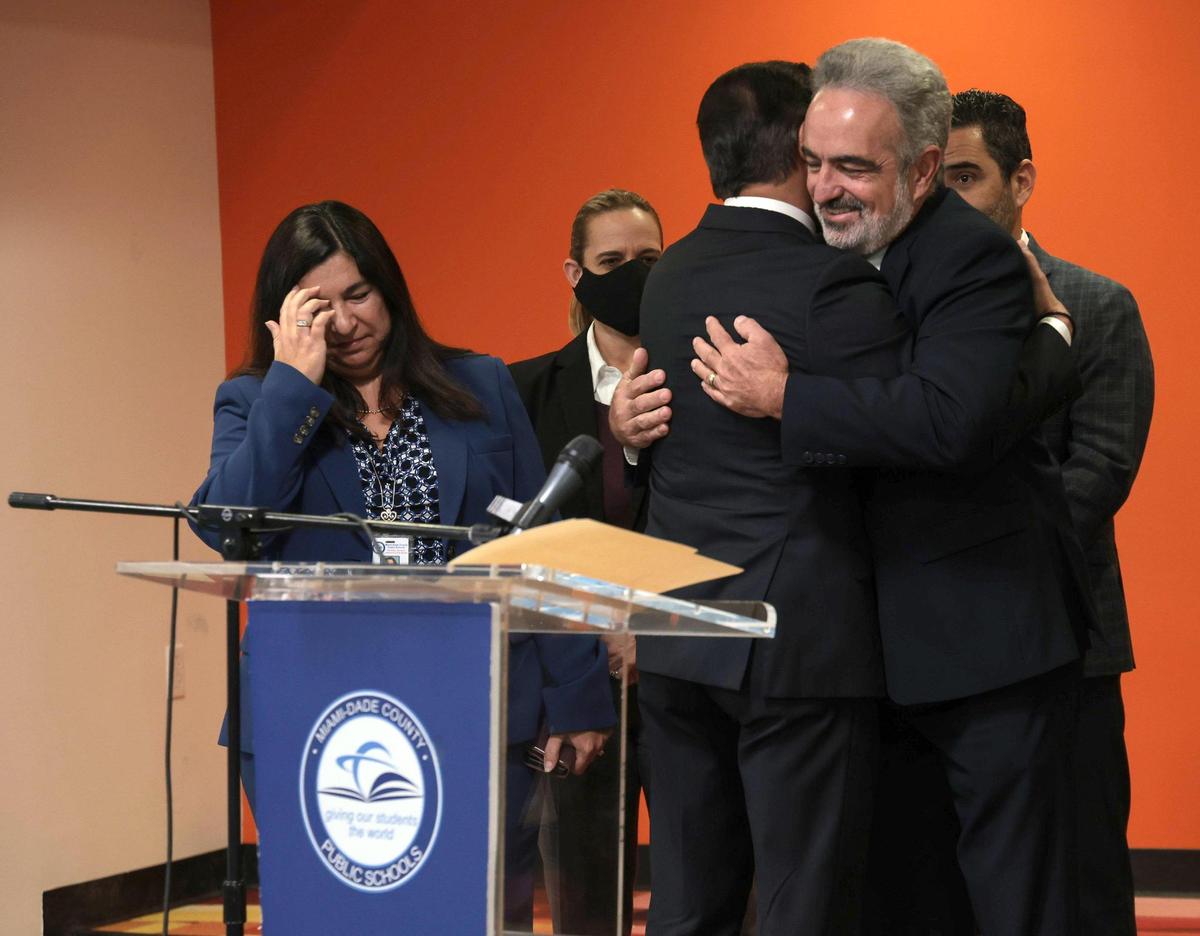 Superintendent Alberto Carvalho embraces members of his staff prior to announcing his departure for Los Angeles. On Thursday, Dec. 9, 2021, Miami-Dade County Public Schools Superintendent Alberto Carvalho announced his departure for Los Angeles as its new superintendent during a press conference at iPrep Academy in Miami.