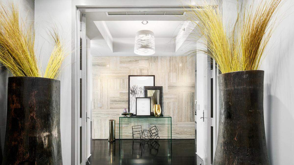 The foyer of the condo at The Bath Club in Miami Beach listed by fashion designer Julian Chang and his partner David Ackerman.