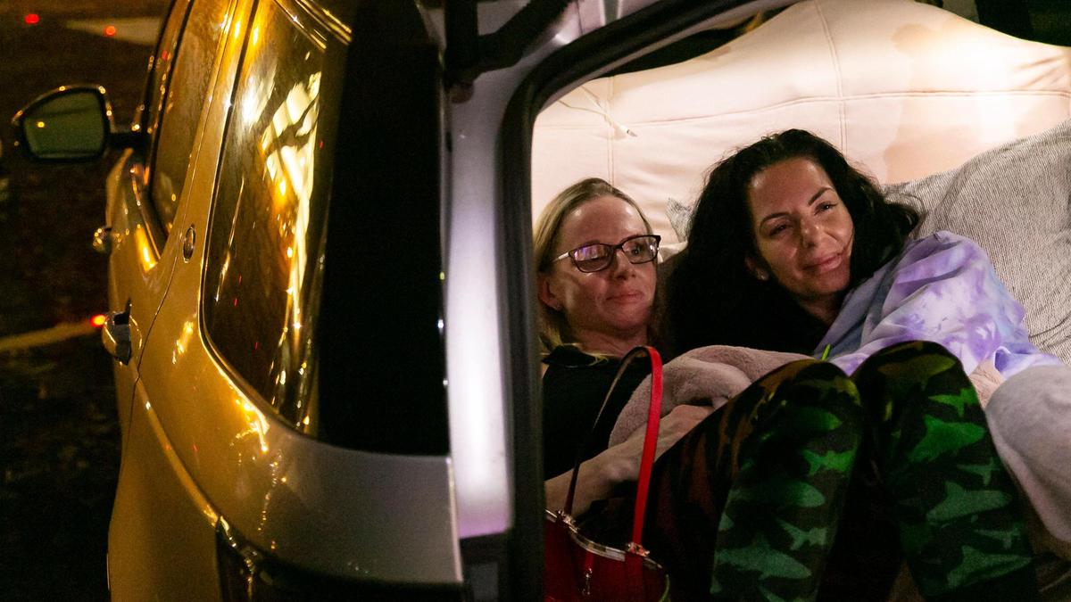 Ana Lee and Kayla Fogarty watch ‘Suspiria’ at the Nite Owl Drive-In theater in downtown Miami on Friday, January 22, 2021.