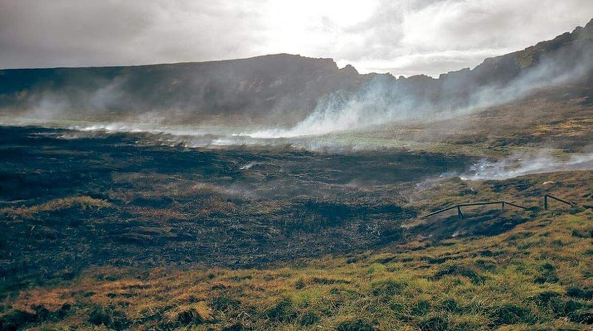 The crater on Easter Island after the fire was contained.