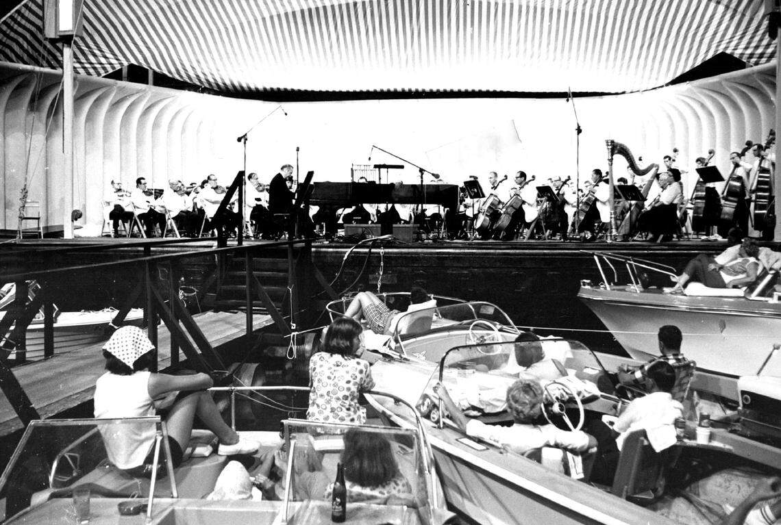 A twilight family concert on stage in 1966 at Miami Marine Stadium, with boats are permitted to dock alongside during the program.