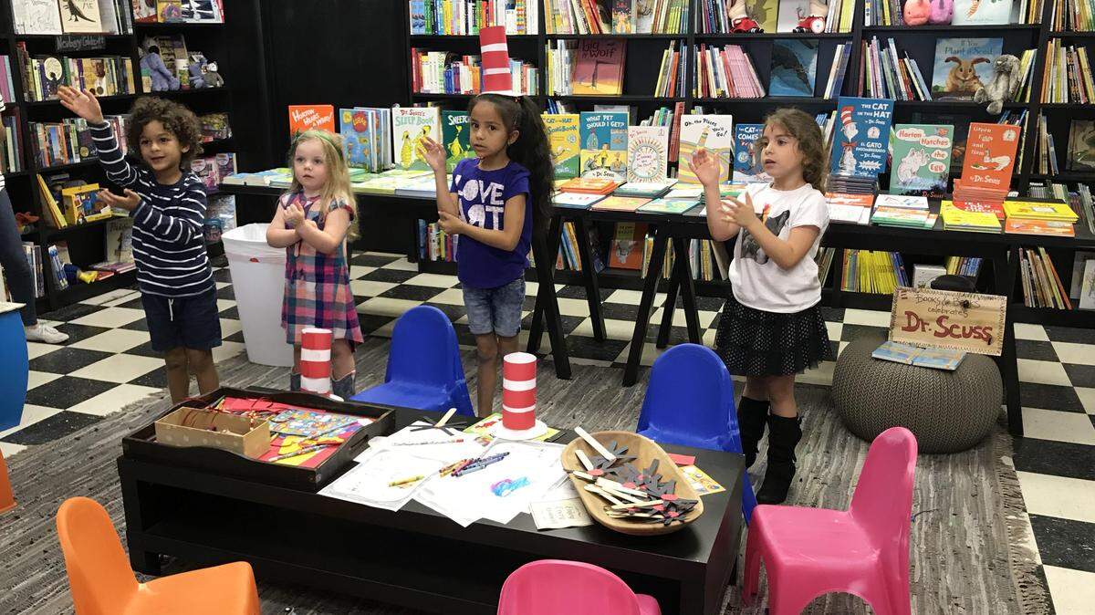 Taking children to the library or a book store over the summer months will help keep their brains sharp. These kids are acting out a Dr. Seuss celebration at Books & Books in Pinecrest in conjunction with the Miami Dade Public Library.