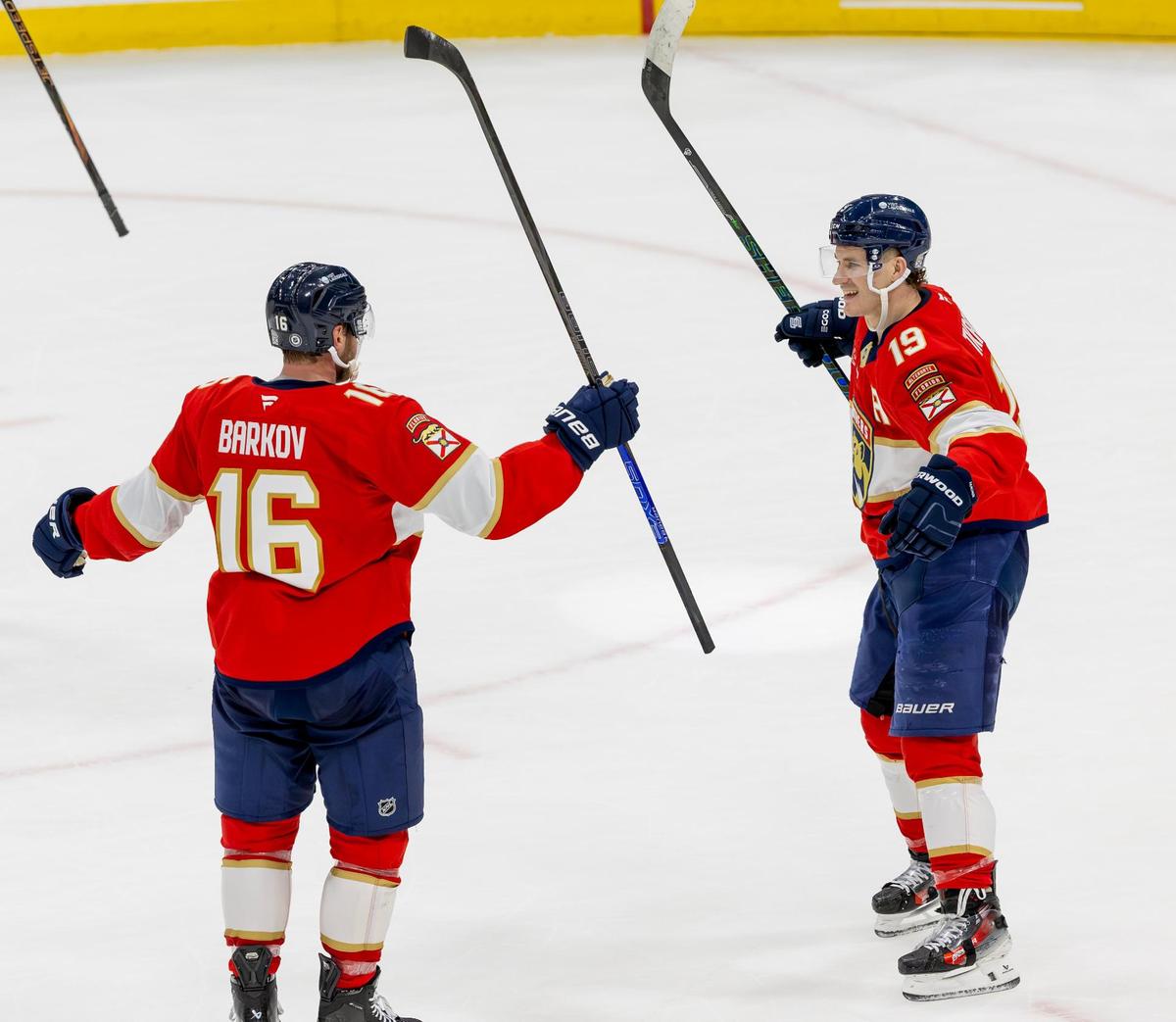 Florida Panthers center Aleksander Barkov (16) celebrates with teammate Matthew Tkachuk (19) after scoring the overtime winner against the St. Louis Blues at Amerant Bank Arena on Friday, Dec. 20, 2024, in Sunrise, Fla.