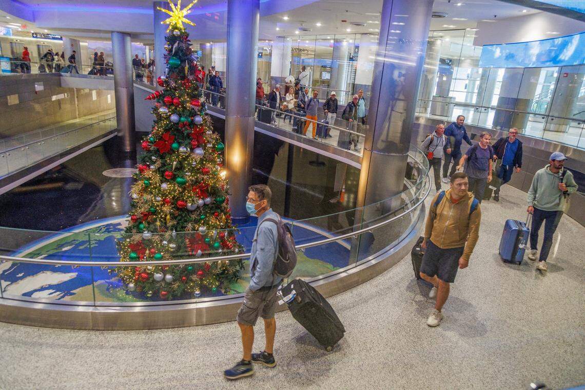 View of passengers coming out of the customs area at Miami International Airport on Wednesday December 20, 2023.