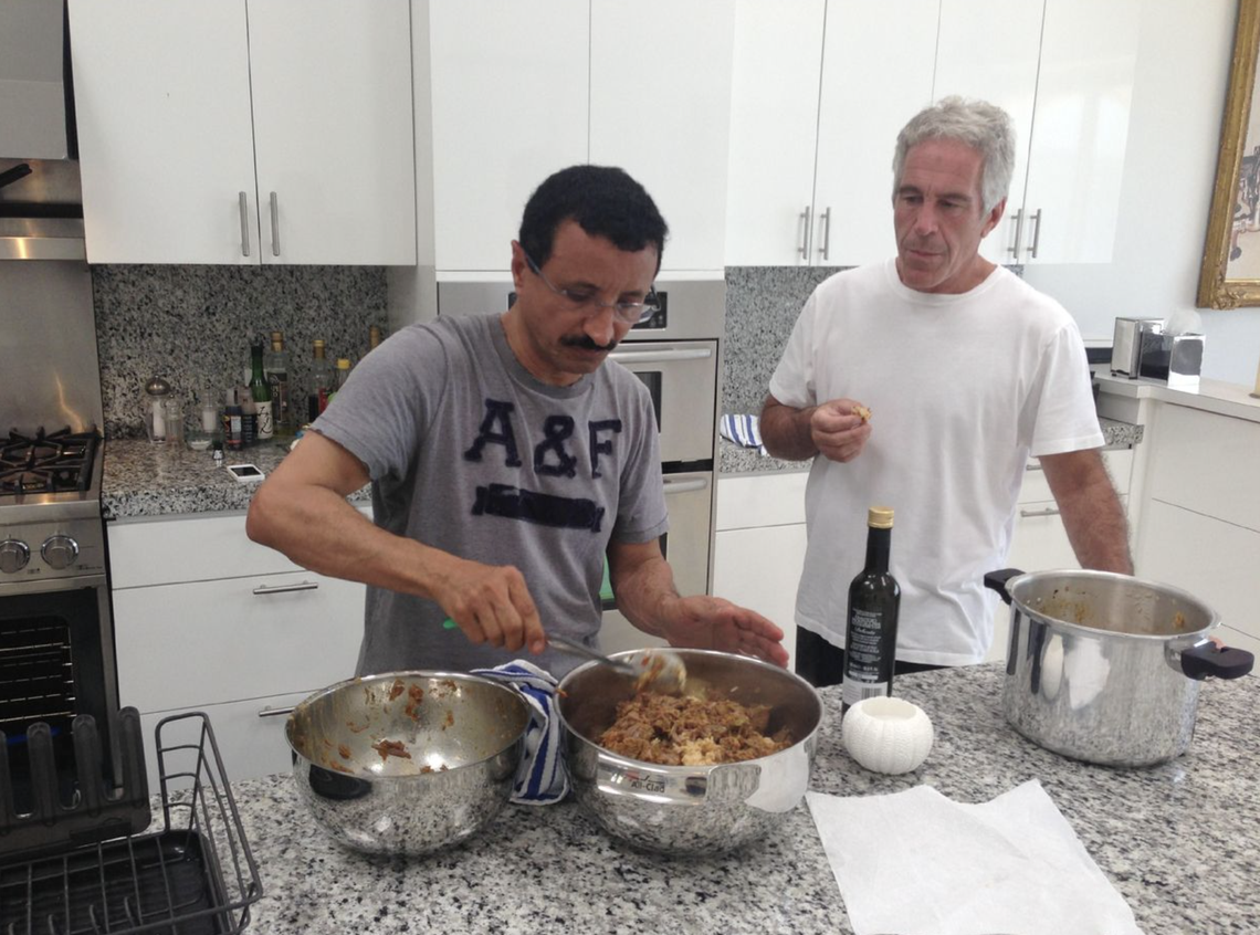 An undated photo released by the U.S. House Oversight Committee shows Sultan bin Sulayem (left), former C.E.O. of Dubai’s D.P. World, preparing food with Jeffrey Epstein (right).