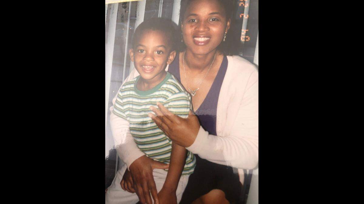 Greg Rousseau is shown at age 3 with his mother Anne.