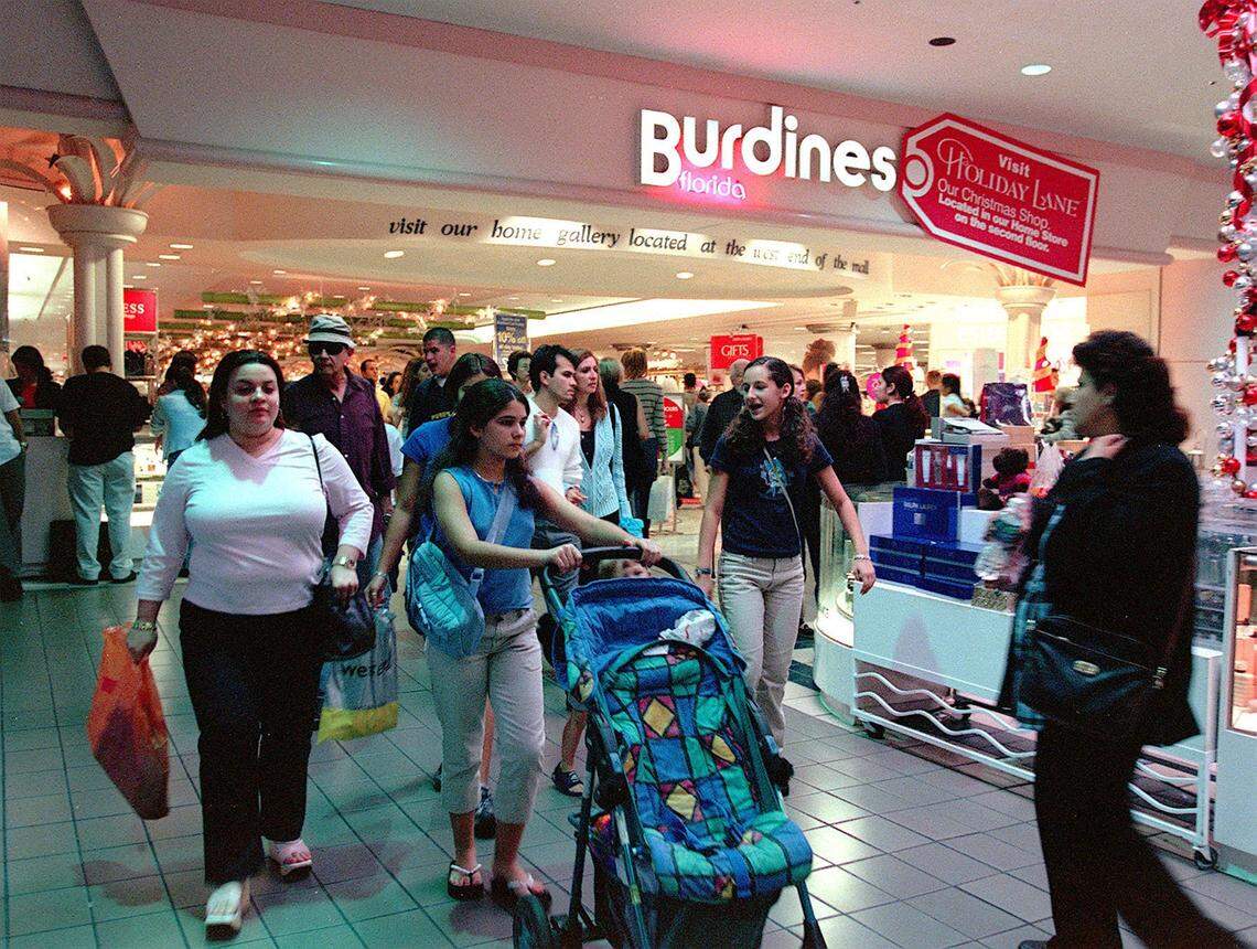 Shoppers invade Dadeland Mall the day after christmas looking for bargains.