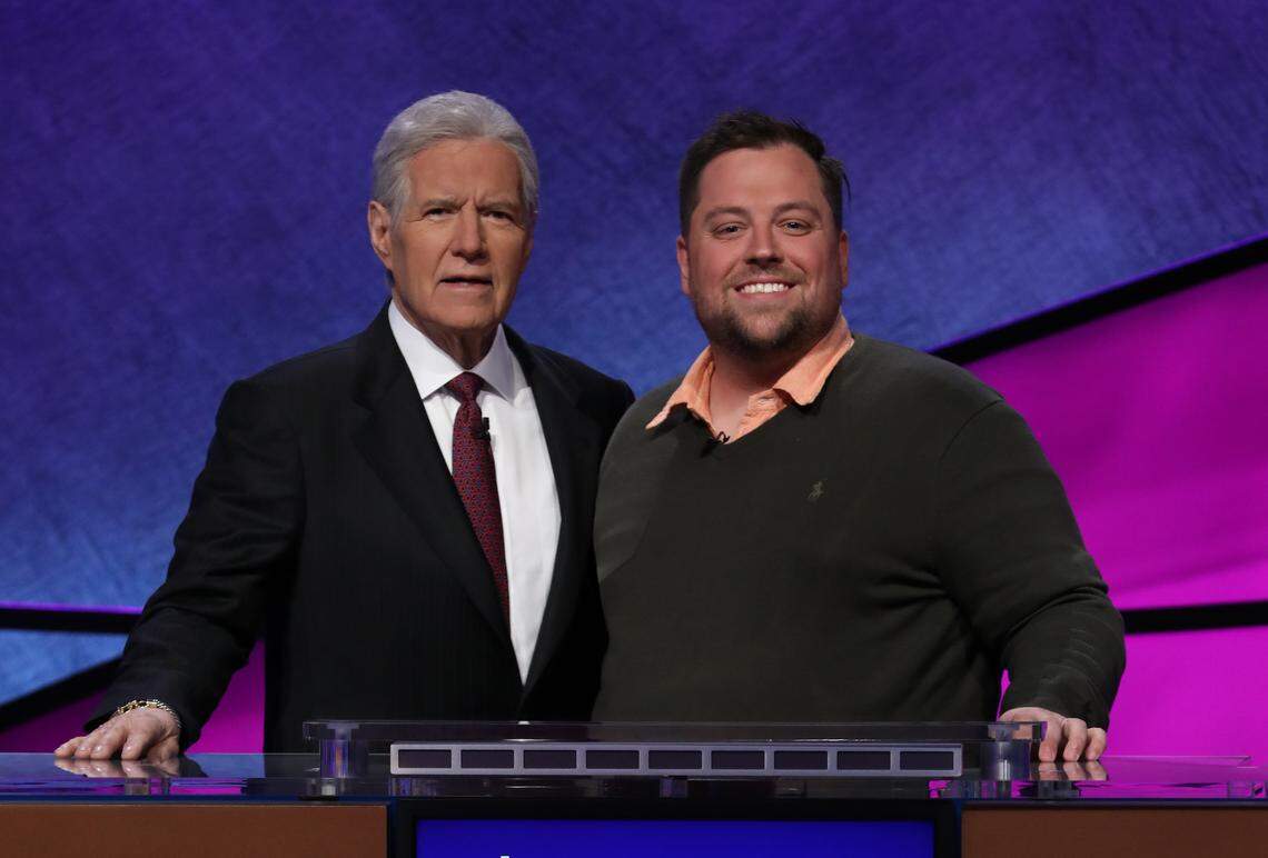 “Jeopardy!” host Alex Trebek and Miami-Dade middle school teacher Matthew Bunch, who will appear in Tuesday’s episode of the annual Teachers Tournament on “Jeopardy!”