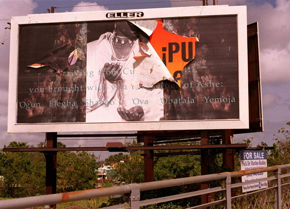 In 2002, a billboard near the Northwest Fifth Avenue bridge at Miami River Drive.