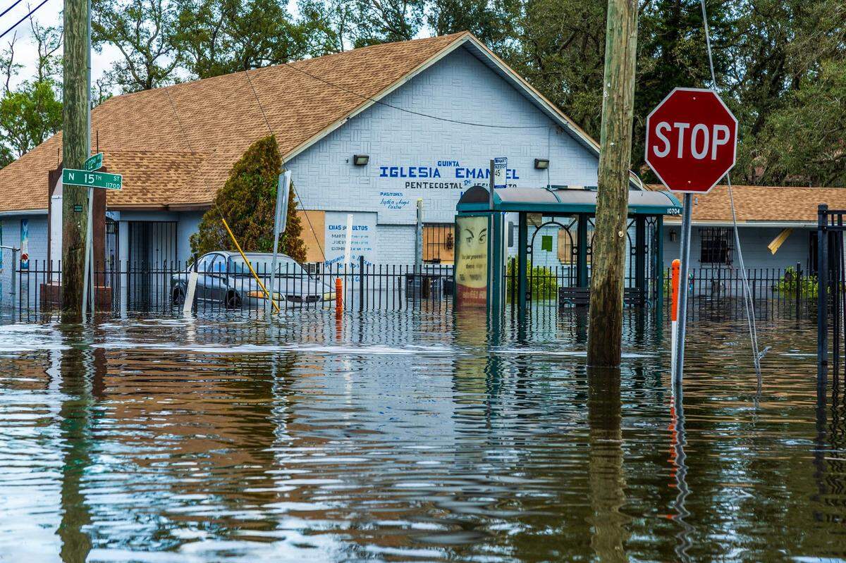 View of flooded streets surrounding the Iglesia Emanuel located at E 122nd Avenue and N 15th St in North Tampa, on Thursday, October 10, 2024, a day after Hurricane Milton crossed Florida’s Gulf Coast.