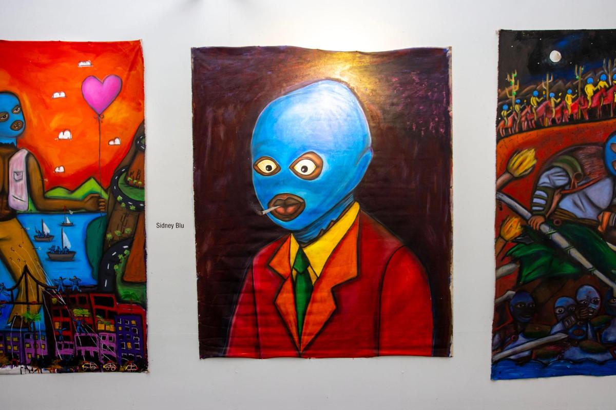 Artwork by artist Sidney Blu is displayed at the Art Prizm Fair.