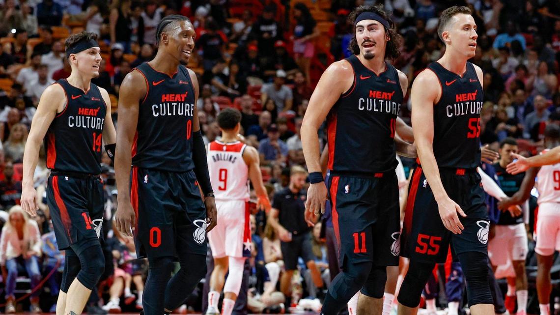 Miami Heat guard Tyler Herro (14), guard Josh Richardson (0), guard Jaime Jaquez Jr. (11), and forward Duncan Robinson (55), react as they walk off the court for a timeout as the Heat lead against the Washington Wizards late in the second half at the Kaseya Center in Miami on Friday, November 3, 2023.