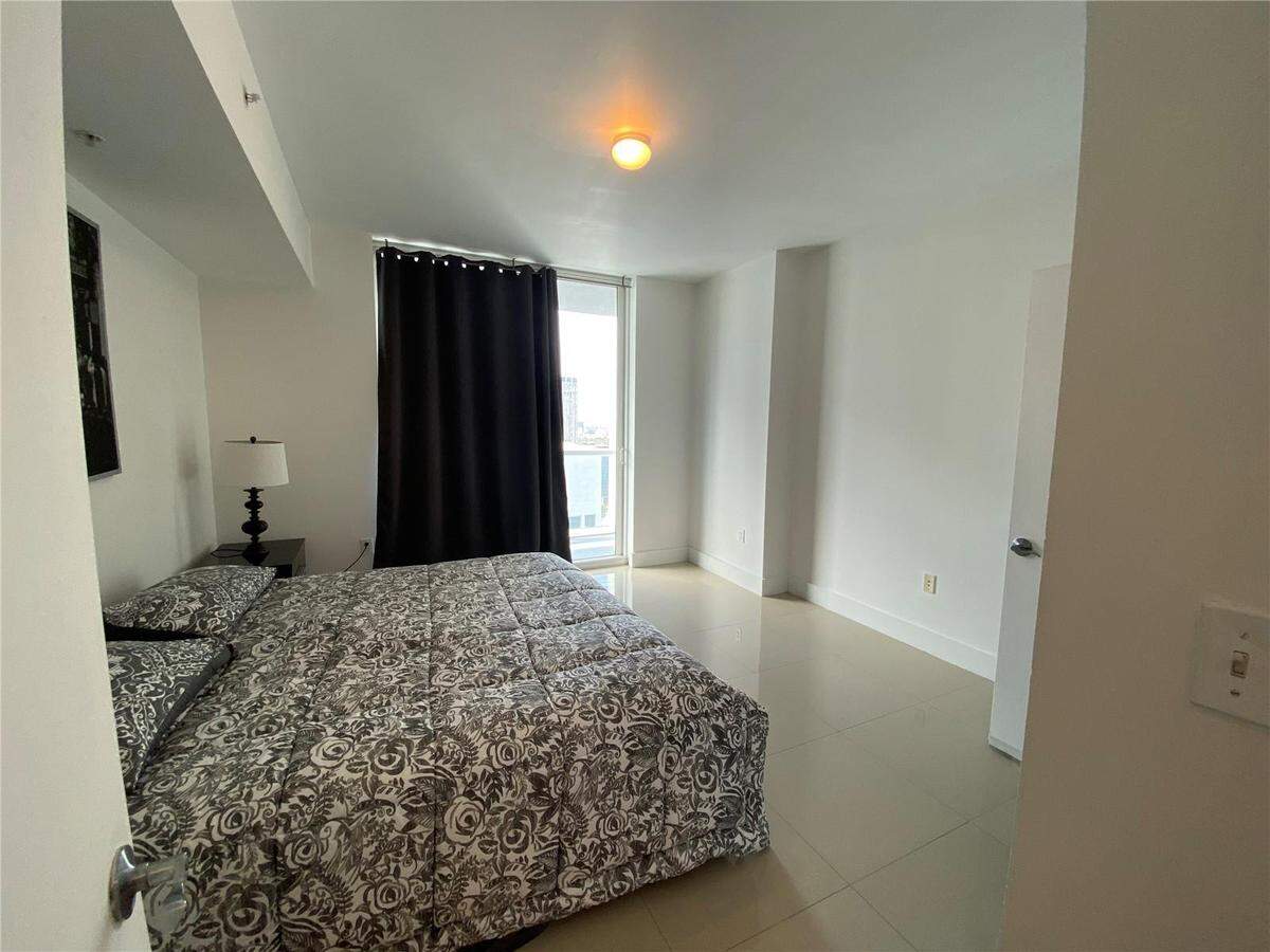 The one-bedroom apartment has a balcony with access from both the living room and bedroom, pictured above. Another plus for the new tenants? A walk-in closet.