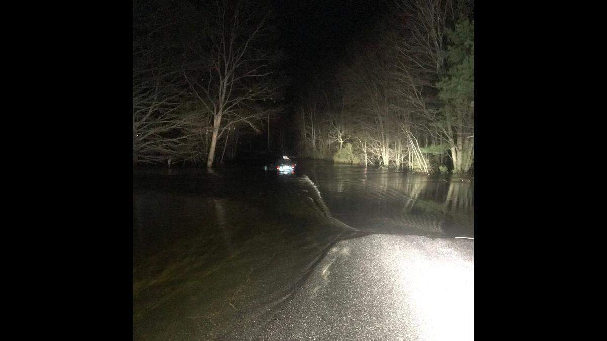 Cries for help in the dark along Maine’s Crooked River led a rescuers to a&nbsp;Florida tourist stuck in a flooded car, according to the Maine Department of Inland Fisheries & Wildlife.