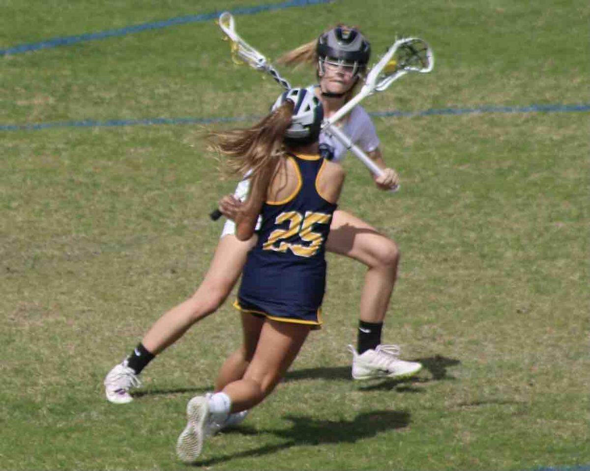St. Thomas Aquinas senior and Louisville commit Peri Riegner (#25) is back hoping to lead the Raiders to back-to-back state championships in lacrosse.