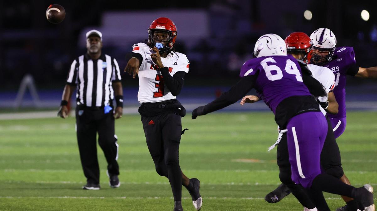 Edison Red Raiders quarterback Emmanuel Poitier Jr (3) throws the football against the True North Titans during the second quarter of a high school football Class 1A Region 4 playoff game at Tropical Park in Miami, Florida, on Thursday, November 21, 2024.