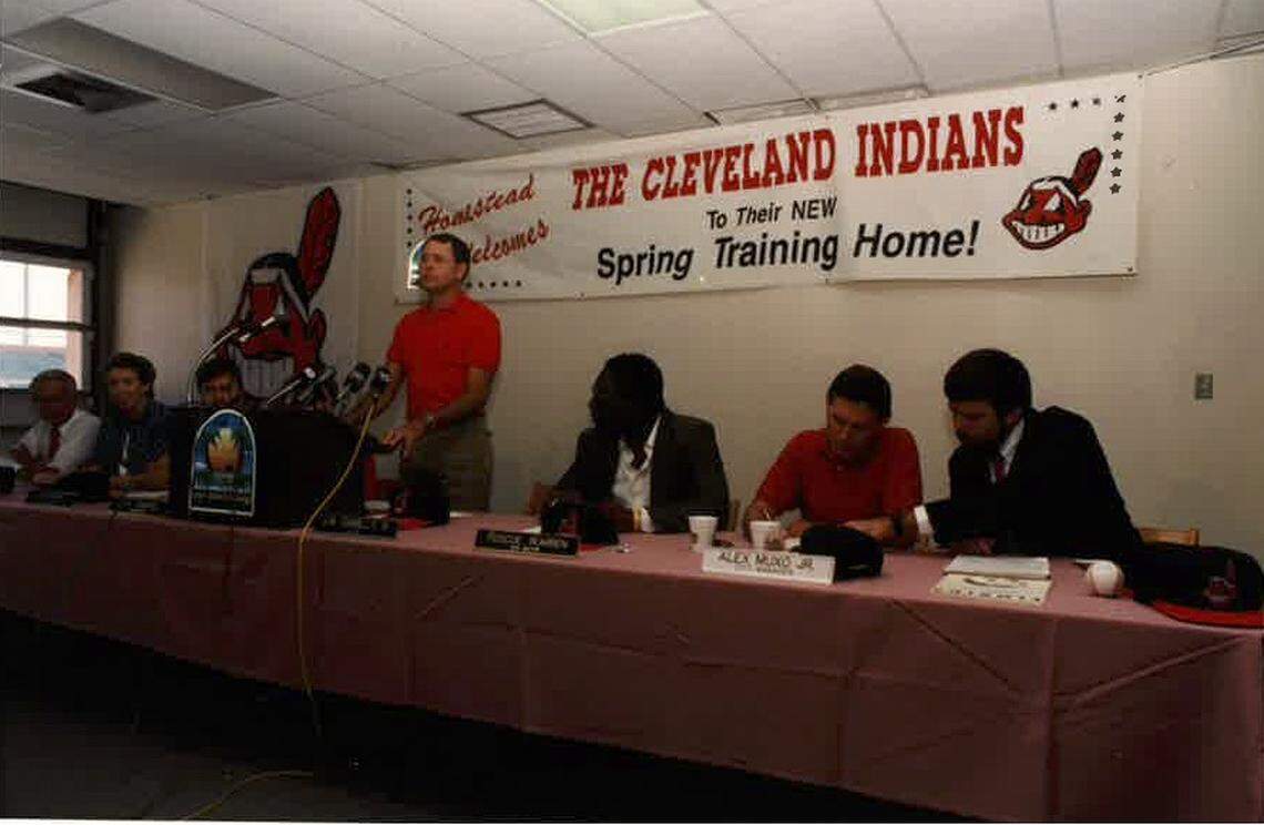 Former Homestead Mayor Tad Demilly stands, as Cleveland Indians attorney Rick Horrow (right) and city manager Alex Muxo (second right) sign a contract in the Homestead Sports Complex in 1991.