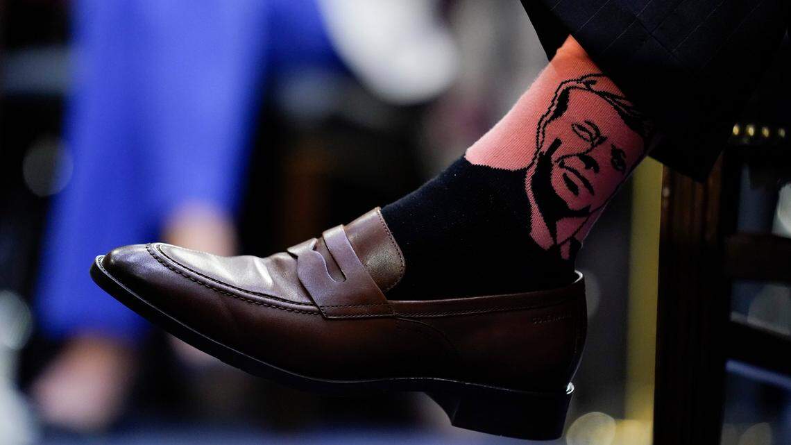 Supreme Court nominee Ketanji Brown Jackson’s husband, Dr. Patrick Jackson, wears socks with the likeness of former President John F. Kennedy on them during her Senate Judiciary Committee confirmation hearing on Capitol Hill in Washington, Wednesday, March 23, 2022.