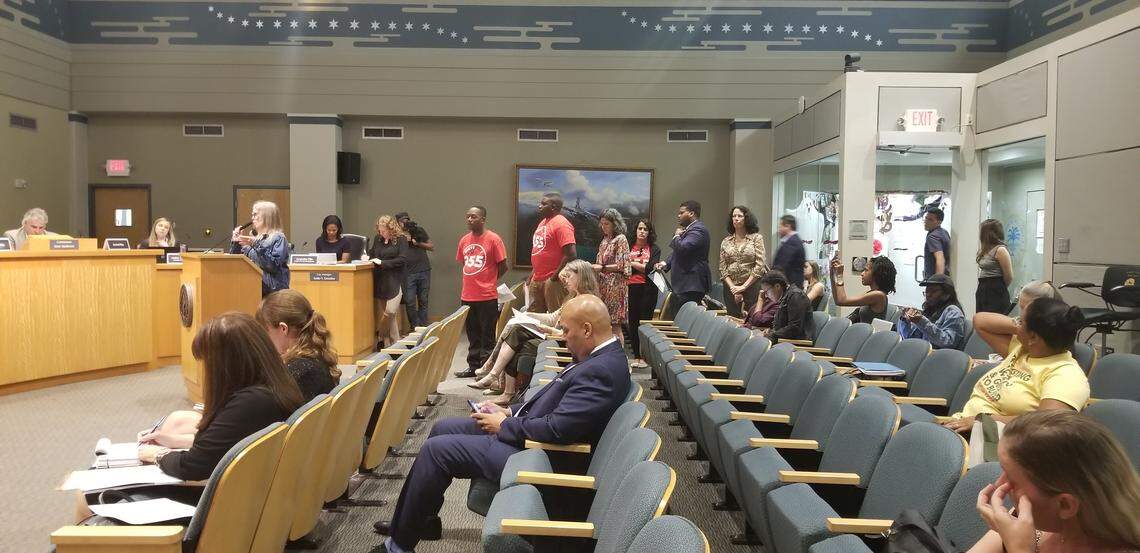 Residents and neighbors of Little Haiti line up to speak at the Planning and Zoning Board hearing on Wednesday, Oct. 16, to protest the proposed Eastside Ridge real estate development.