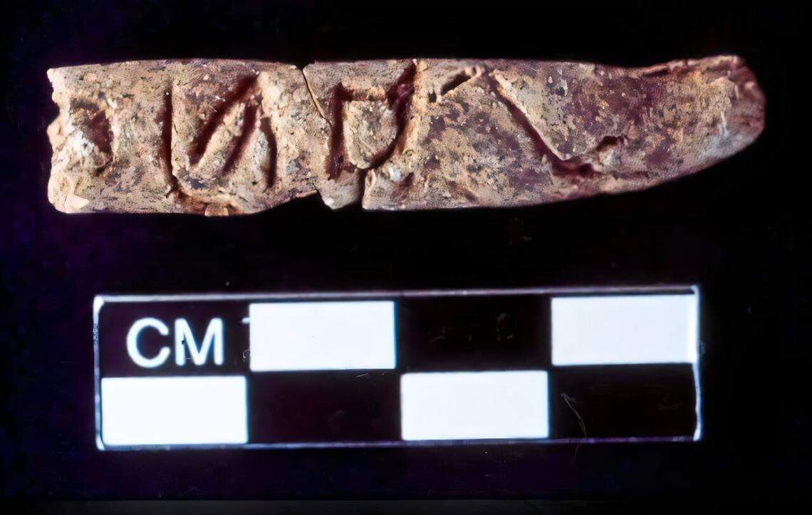 The clay cylinders are etched with what appear to be letters, archaeologists said.