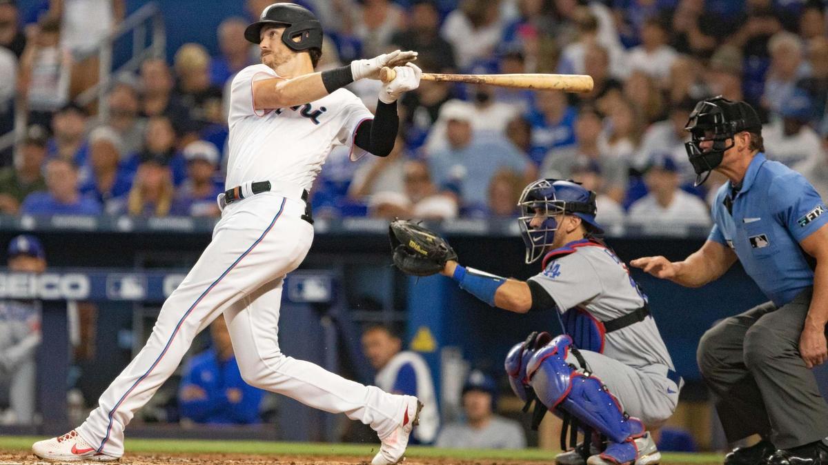 Miami Marlins third baseman Brian Anderson (15) hits a home run during the fourth inning of their loss to the Los Angeles Dodgers at loanDepot park in Miami on Sunday.
