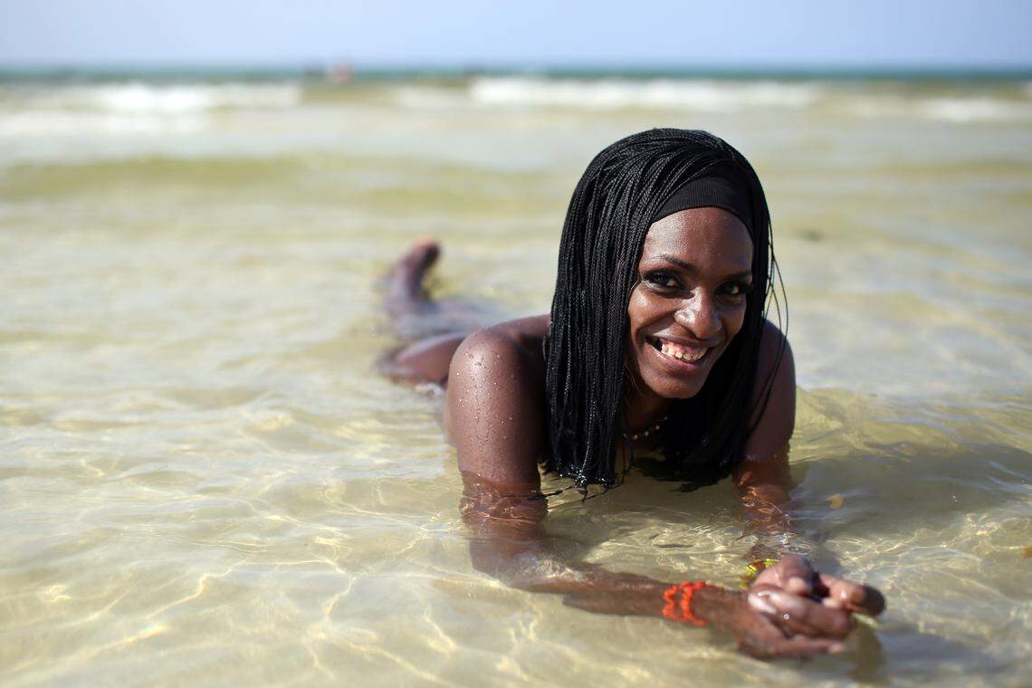 The transgender woman Isabel Crono, whose legal name is Ahmed Esonda, 43, poses at Mi Cayito beach, a meeting place in Havana, Cuba, for the gay community.