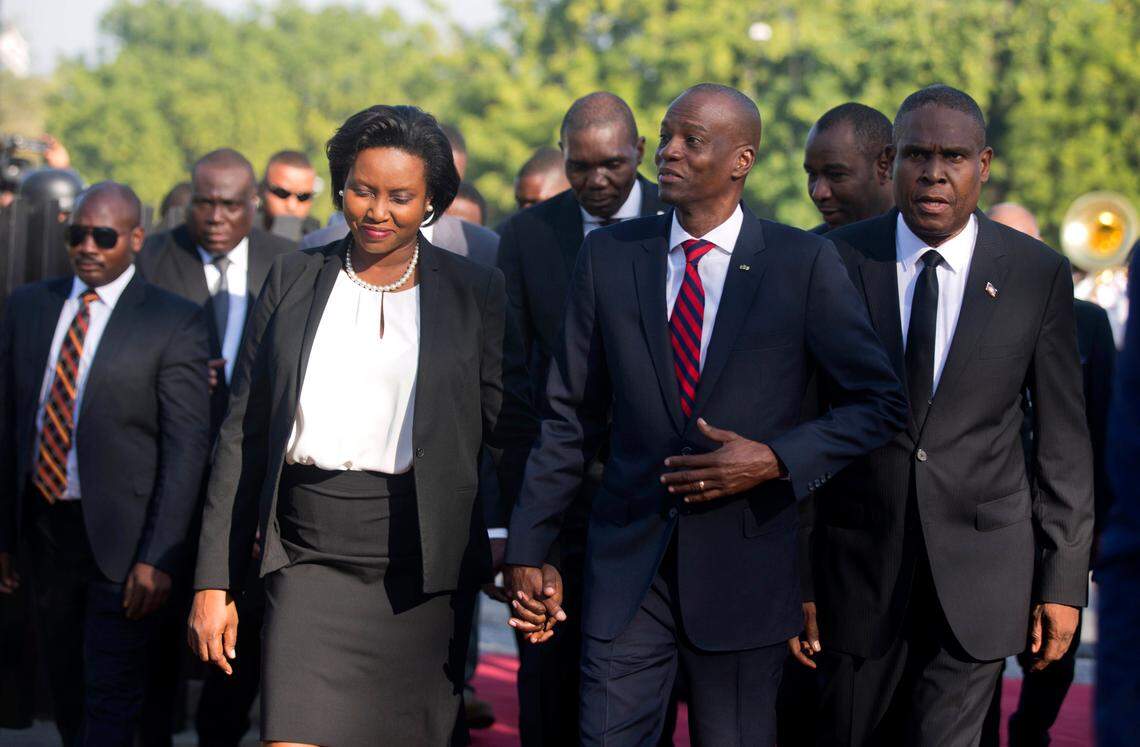 Haiti’s President Jovenel Moise arrives with his wife, Martine, and Prime Minister Jean Henry Ceant during a ceremony marking the 215th anniversary of Battle of Vertieres in Port-au-Prince, Haiti, Sunday, Nov. 18, 2018. The battle was the last major battle of Haitian independence from the French.