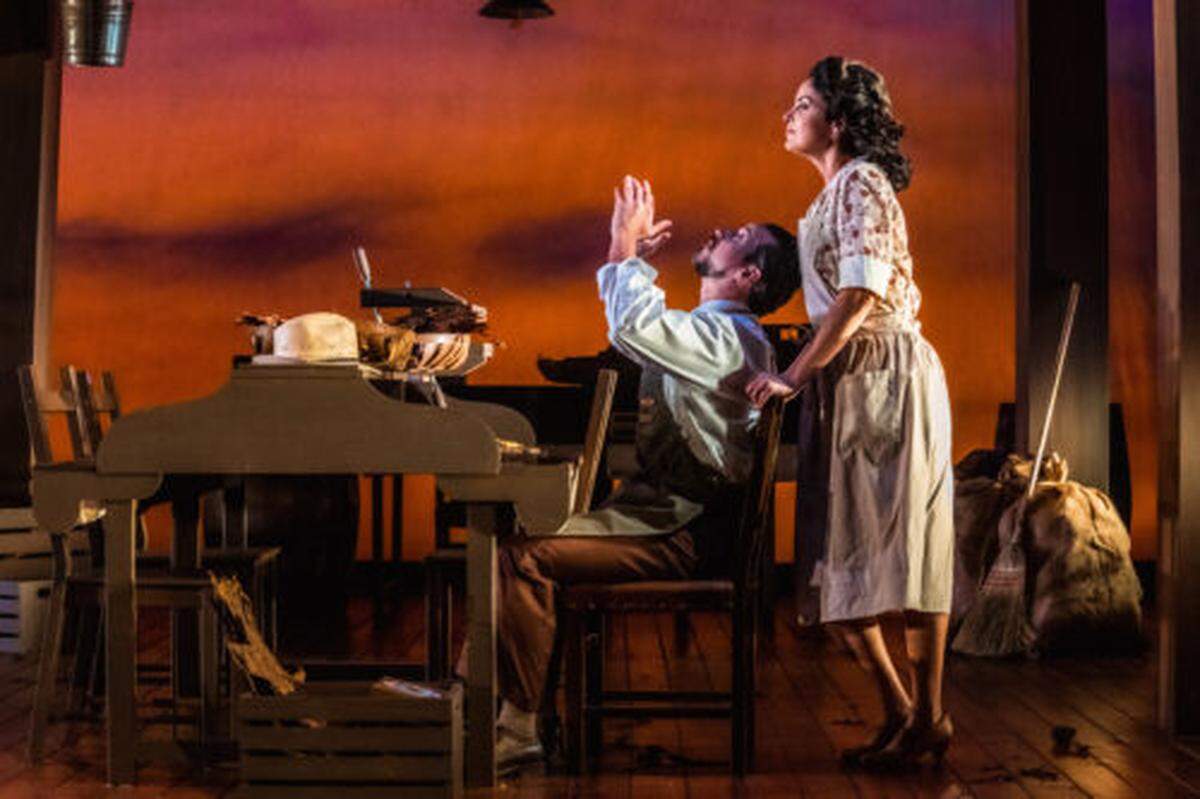 Brandon Espinoza’s Palomo expresses his feelings to Hannia Guillen as his wife Conchita in Nilo Cruz’s “Anna in the Tropics.”