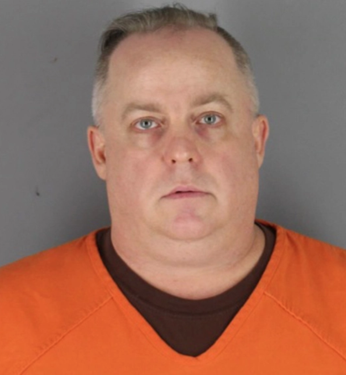 Lloyd Edward Johnson was arrested Wednesday after police say he brandished a gun at a group of black teens.