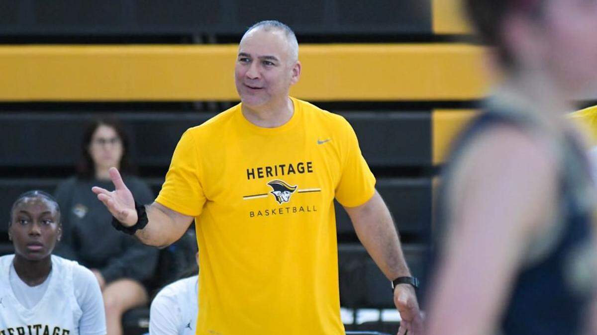 Plantation American Heritage girls’ basketball coach Greg Farias calls out to his team during the first quarter of a regular-season game against North Broward Prep on Saturday, Jan. 7, 2023.