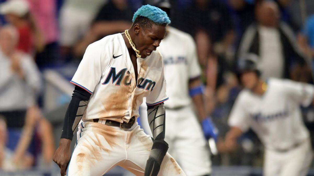 Miami Marlins’ Jazz Chisholm Jr. celebrates scoring a run in the seventh inning of a baseball game against the Arizona Diamondbacks, Monday, May 2, 2022, in Miami.