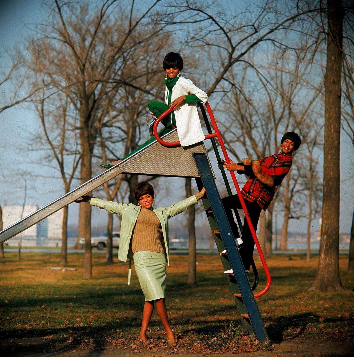 This Aug. 19, 1966 file photo shows The Supremes, with Diana Ross, lead singer on top of the slide, while Mary Wilson climbs the stairs and Florence Ballard stands underneath.