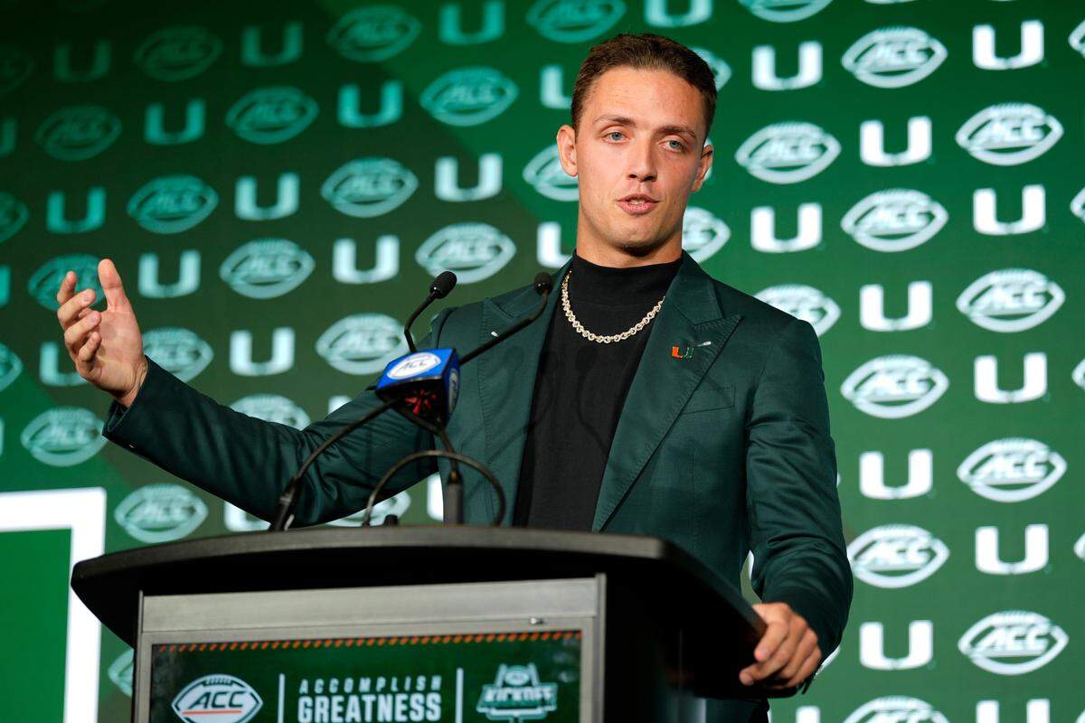 Jul 22, 2025; Charlotte, NC, USA; Miami quarterback Carson Beck answers questions from the media during ACC Media Days at Hilton Charlotte Uptown.