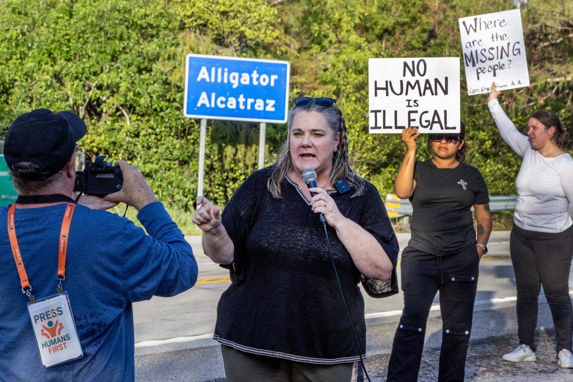 Member of the First Methodist Church in Florida City Kim Torres speaks during a vigil outside Alligator Alcatraz on Sunday, October 19, 2025, in Ochopee, Fla.