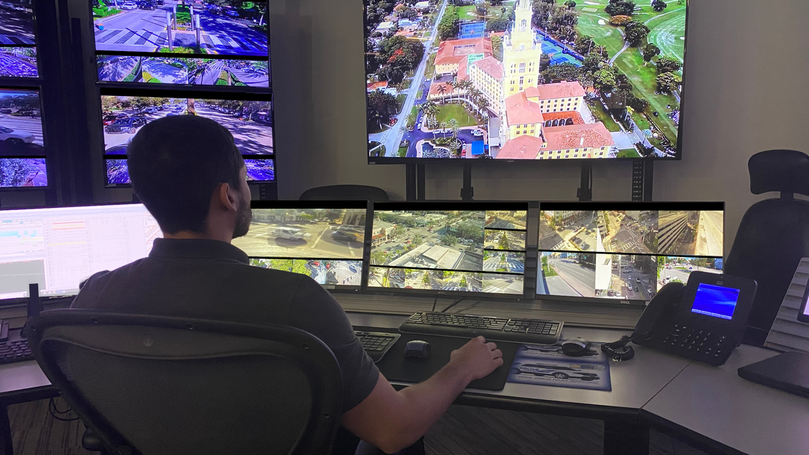 An analyst monitors drone and traffic footage in the Coral Gables Police Department’s Community Information Center