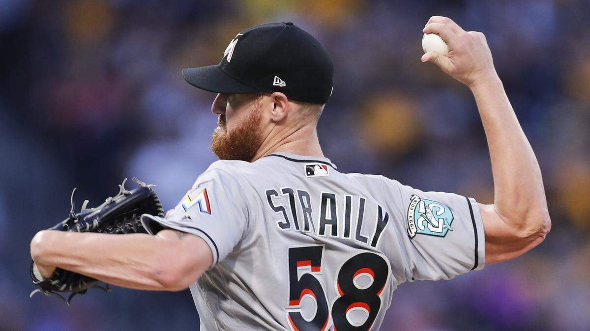 Miami Marlins starter Dan Straily pitches against the Pittsburgh Pirates in the first inning of a baseball game, Friday, Sept. 7, 2018, in Pittsburgh.